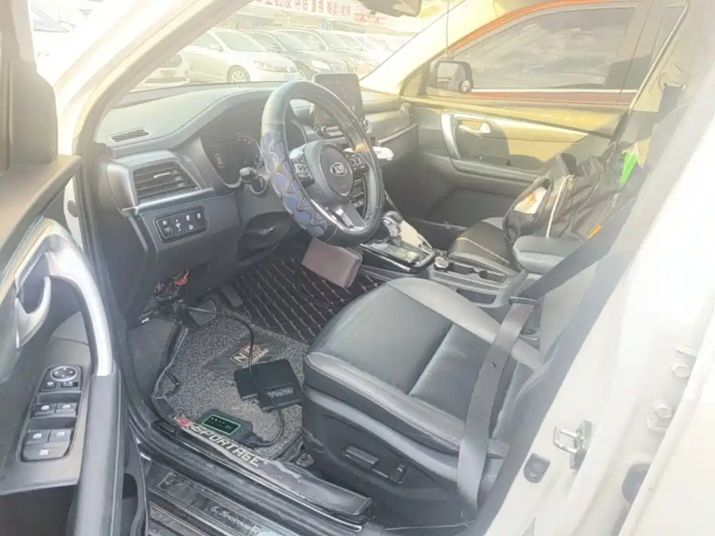 Kia Sportage — фото 14