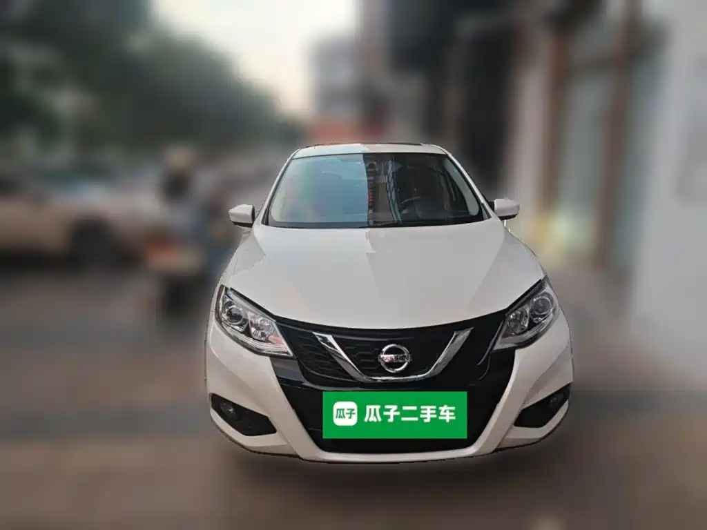 Nissan Tiida — фото 2