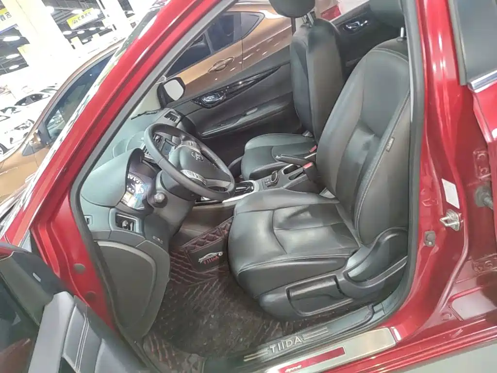 Nissan Tiida — фото 14