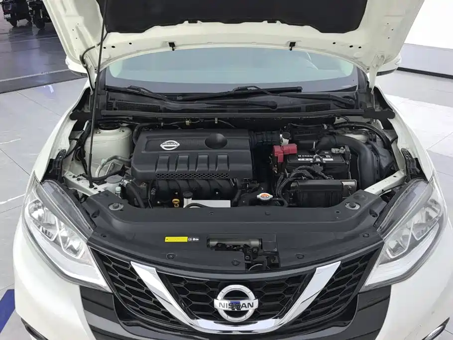 Nissan Tiida — фото 10