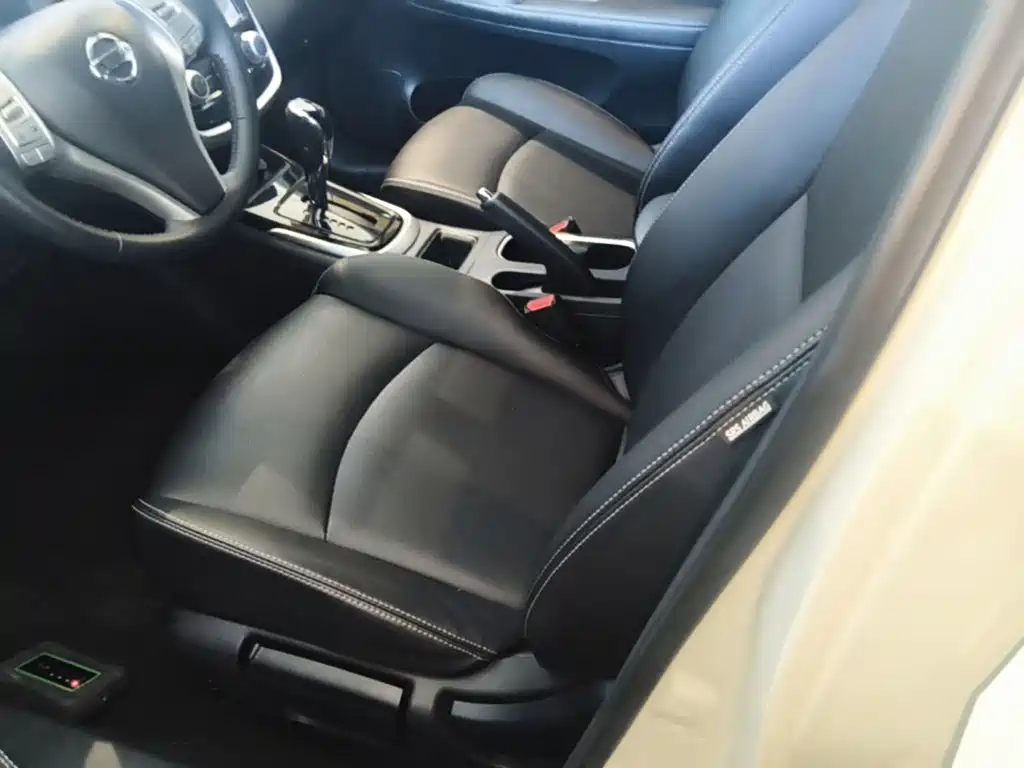 Nissan Tiida — фото 14