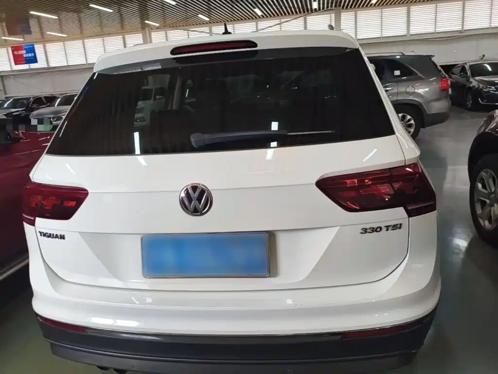 Volkswagen Tiguan — фото 5