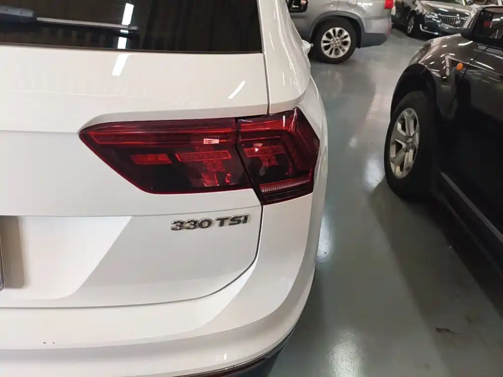 Volkswagen Tiguan — фото 7