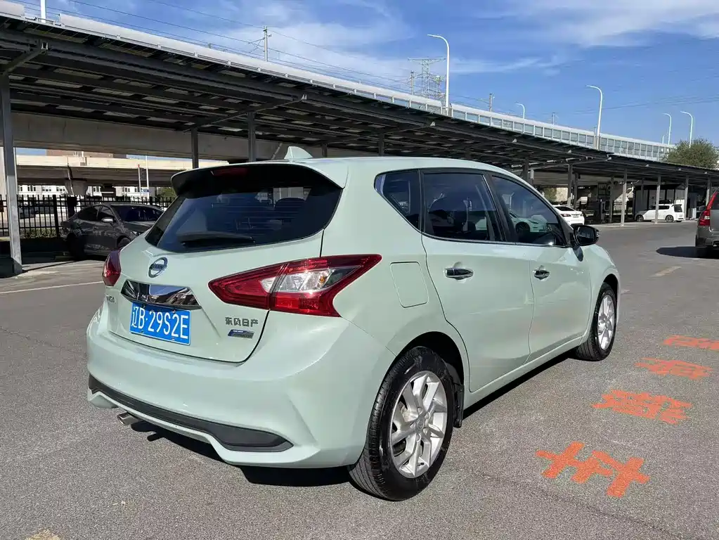 Nissan Tiida — фото 9