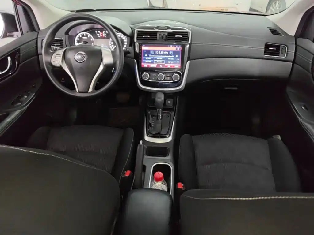 Nissan Tiida — фото 9