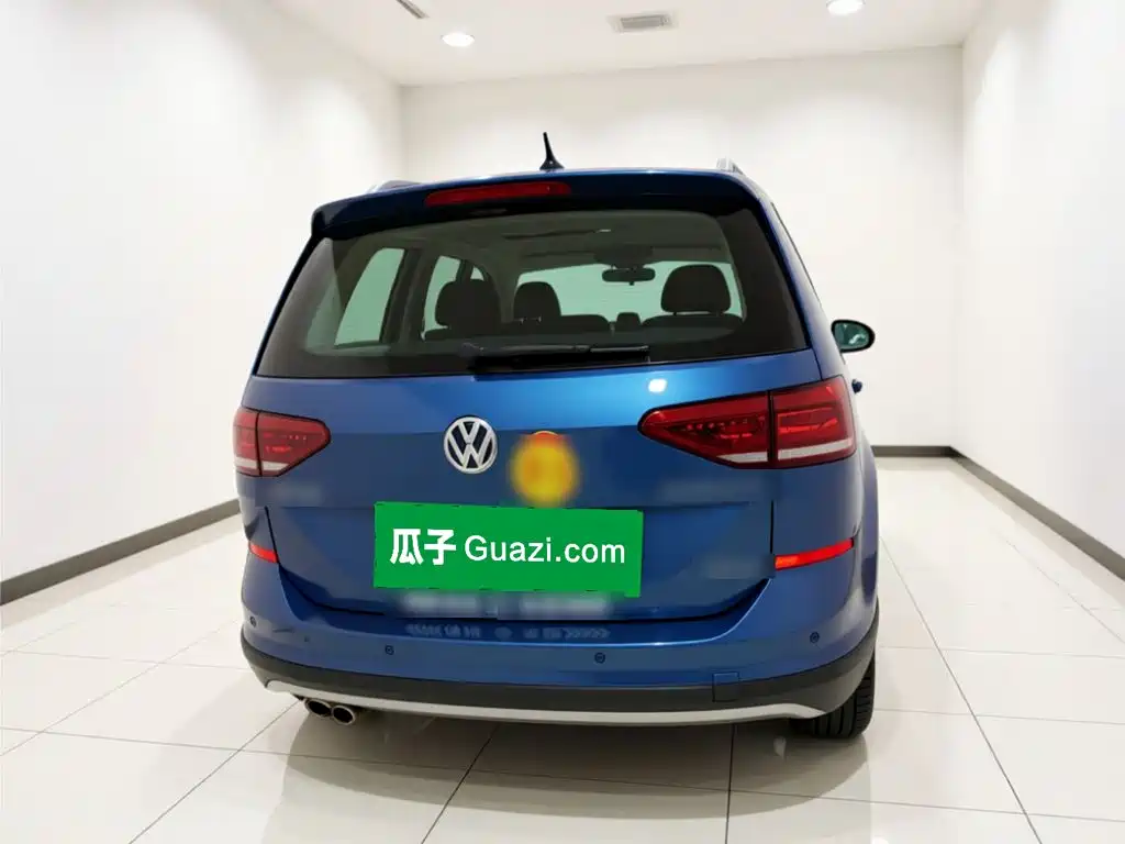 Volkswagen Touran — фото 5