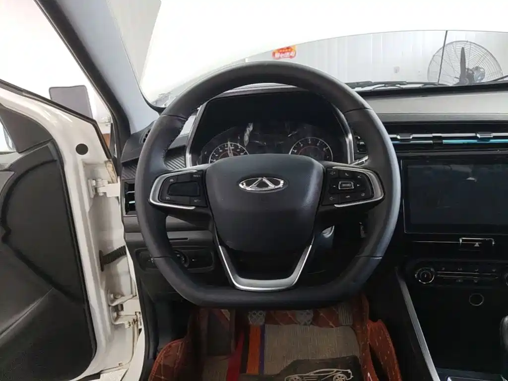 Chery Tiggo 3x — фото 10