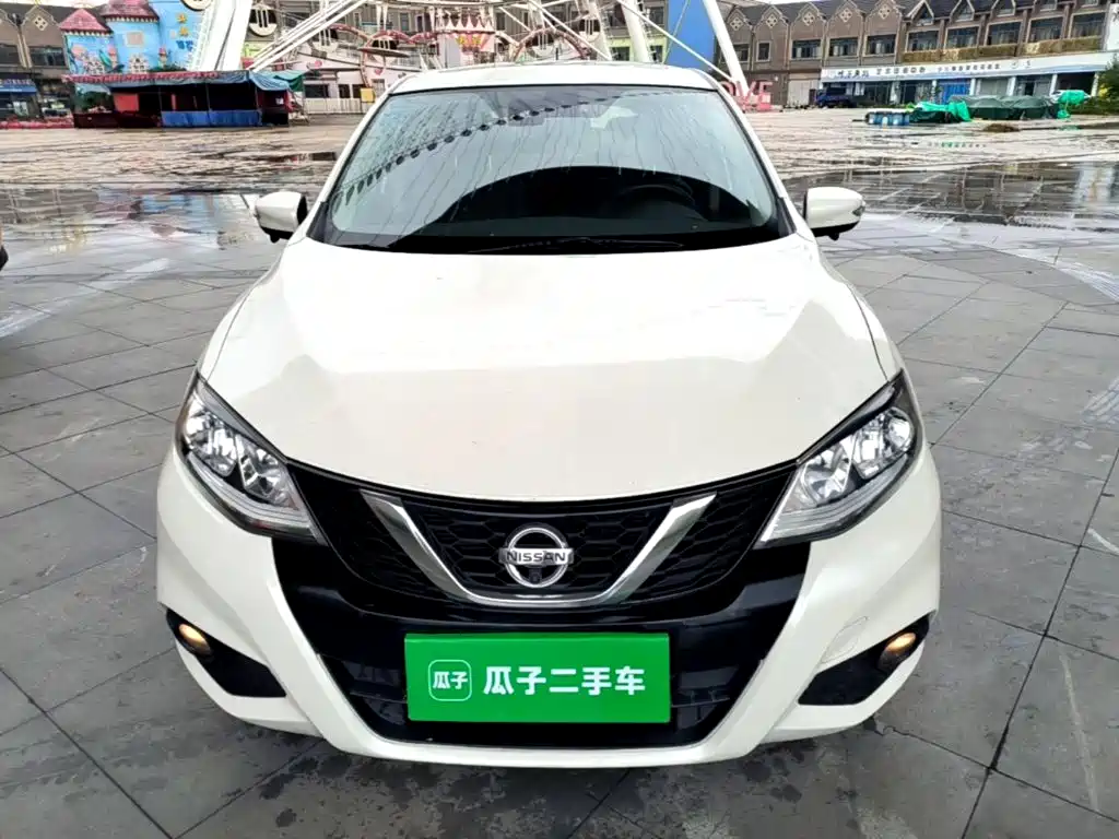 Nissan Tiida — фото 2