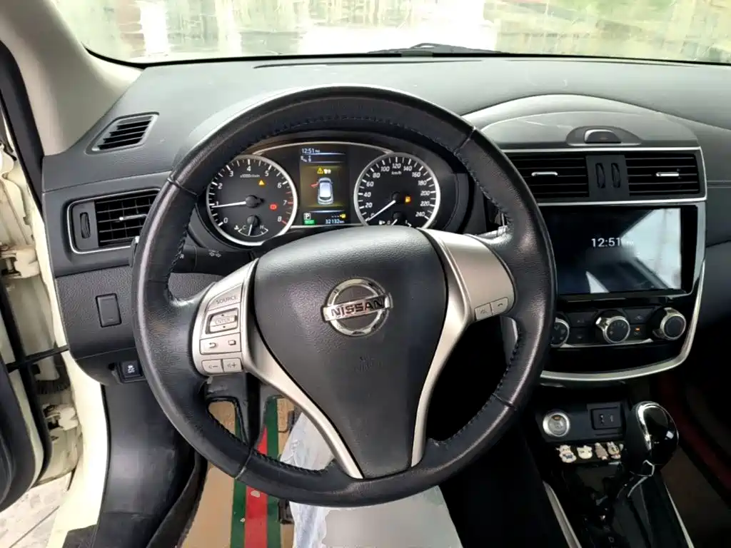 Nissan Tiida — фото 10