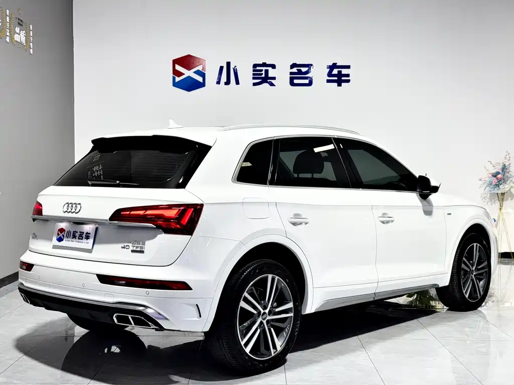 Audi Q5L — фото 7