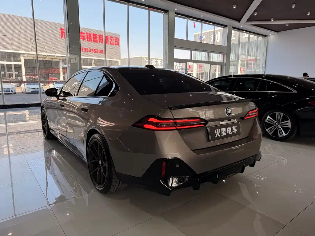 BMW i5 M60 — фото 21