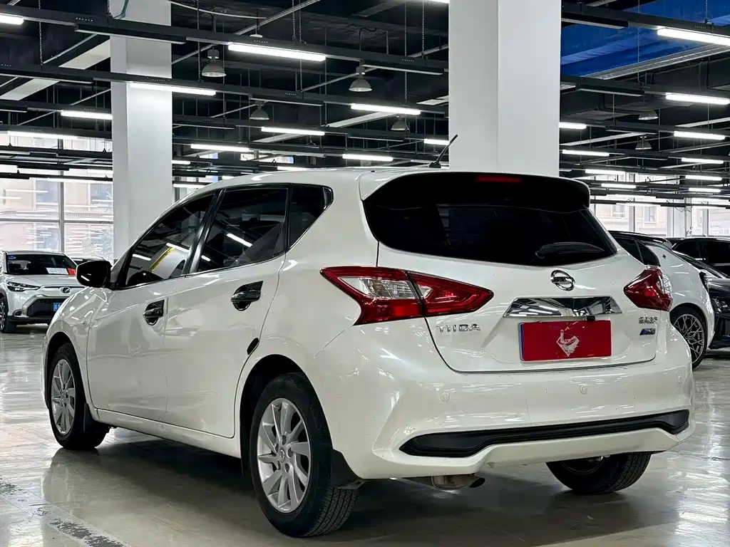 Nissan Tiida — фото 9