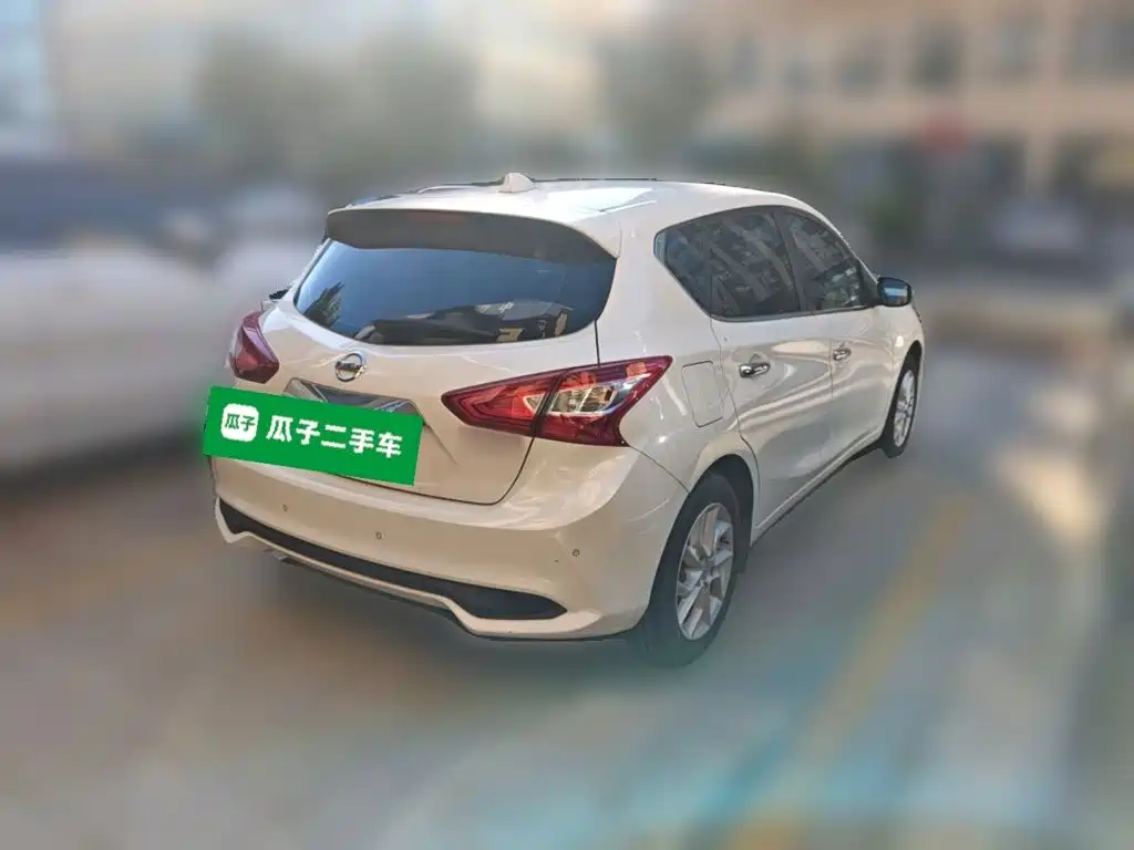 Nissan Tiida — фото 4