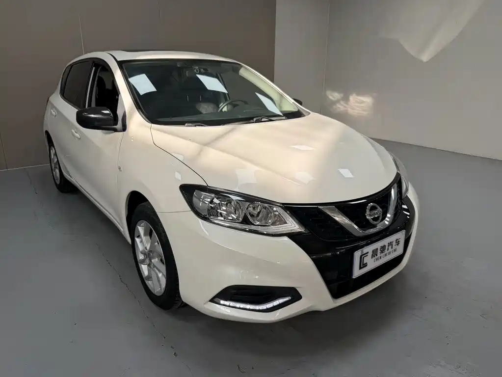 Nissan Tiida — фото 2