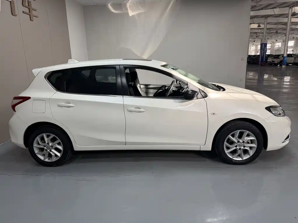Nissan Tiida — фото 13