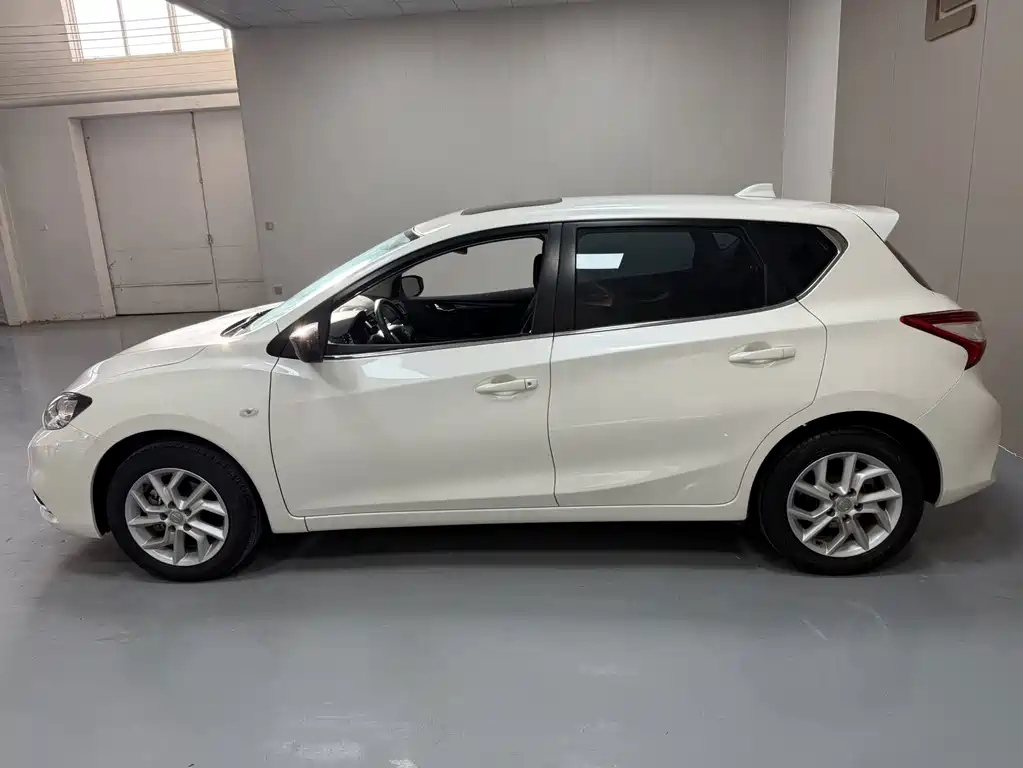 Nissan Tiida — фото 14