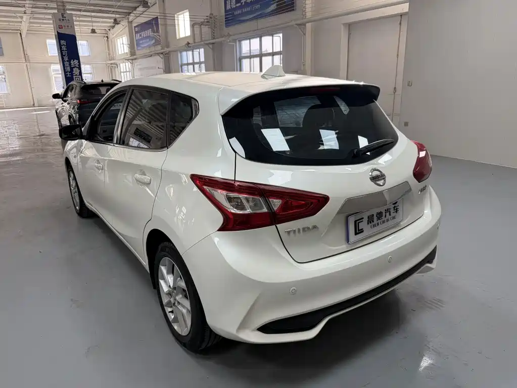 Nissan Tiida — фото 6