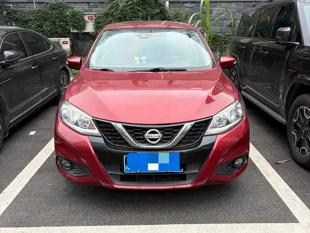 Nissan Tiida — фото 2