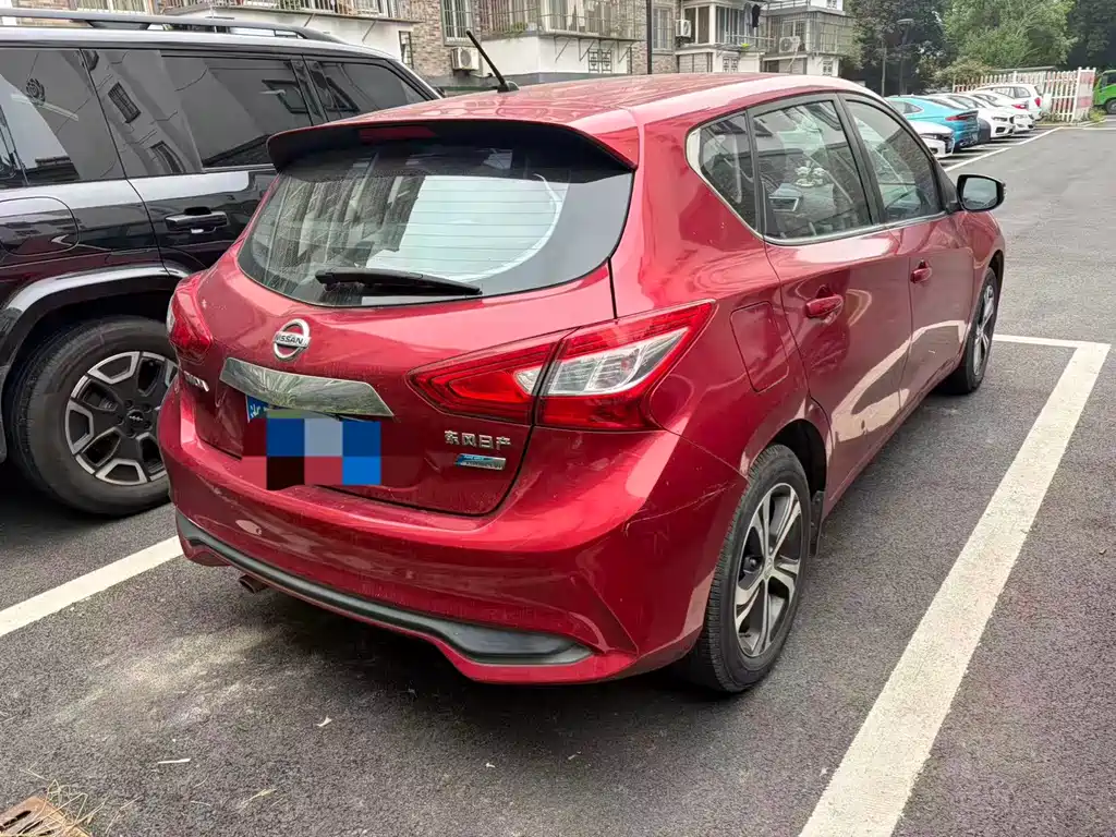 Nissan Tiida — фото 4