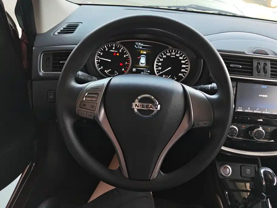 Nissan Tiida — фото 15