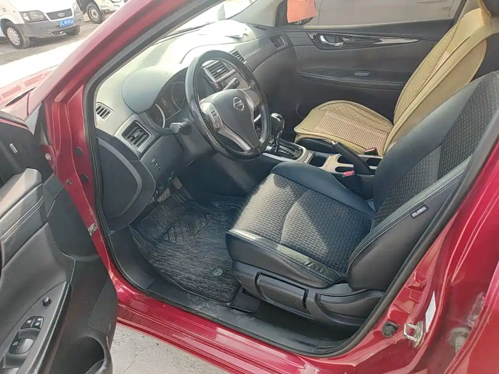 Nissan Tiida — фото 14