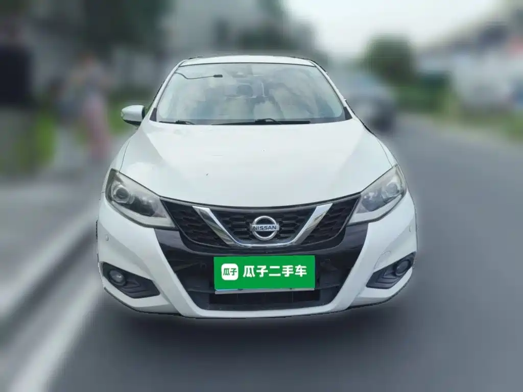 Nissan Tiida — фото 2