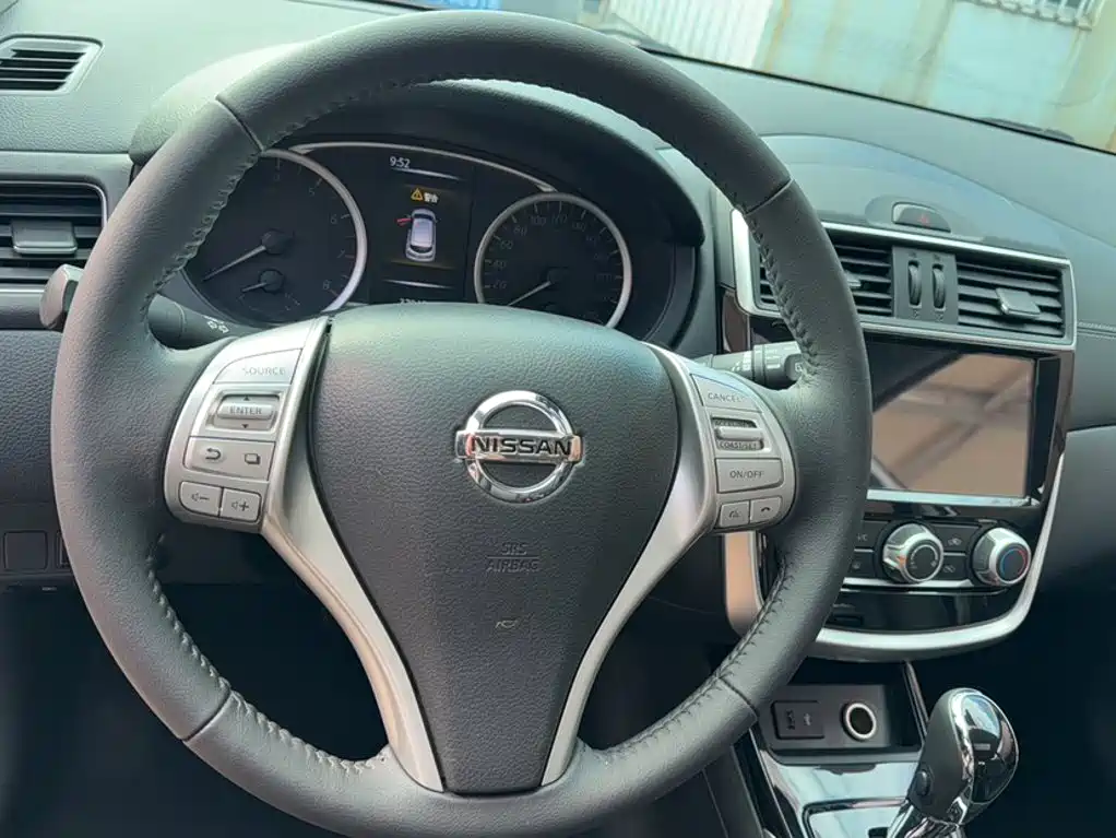 Nissan Tiida — фото 15