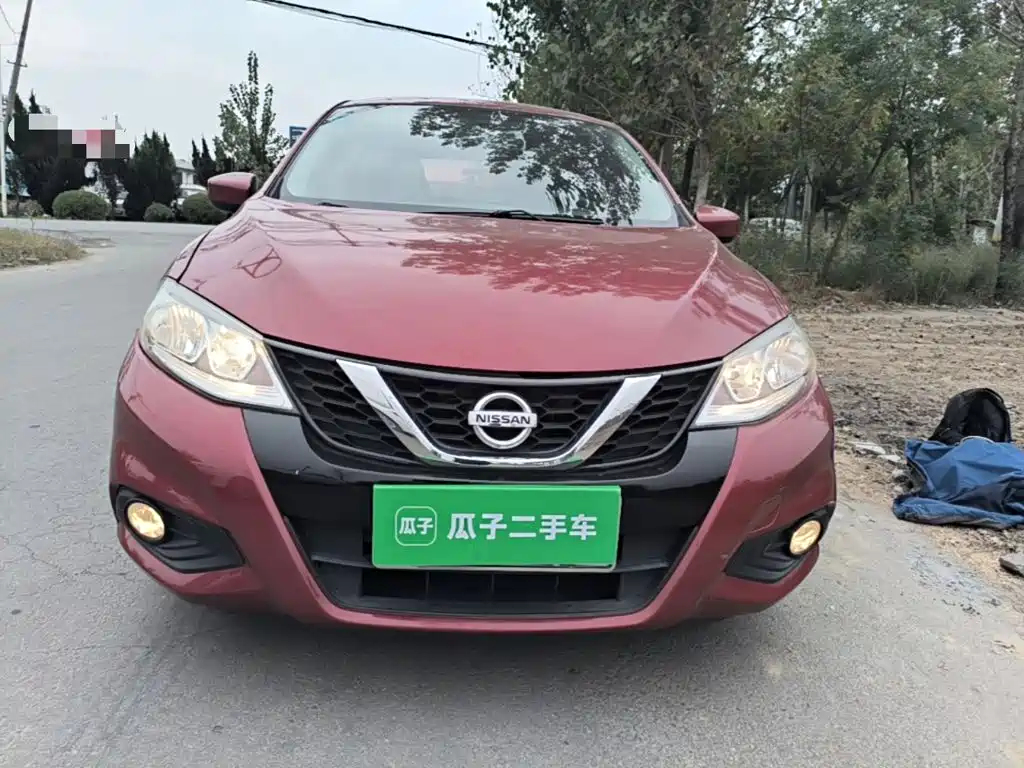 Nissan Tiida — фото 2