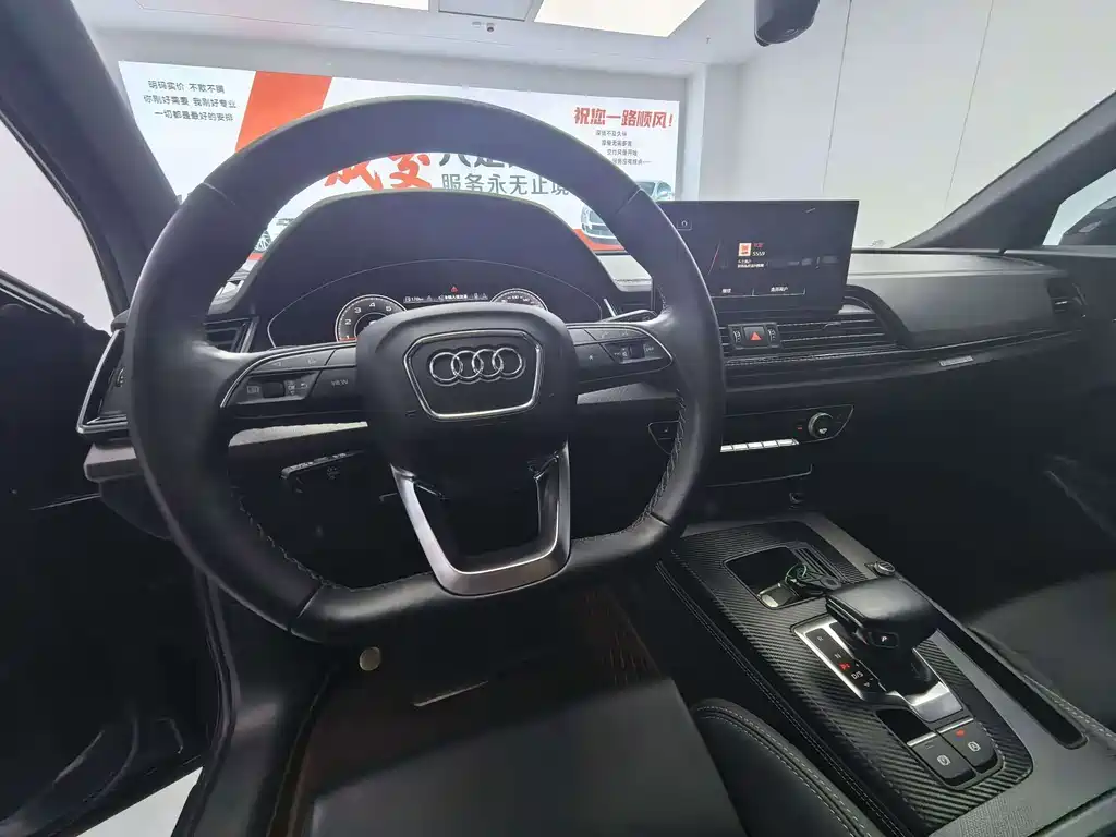 Audi Q5L — фото 10