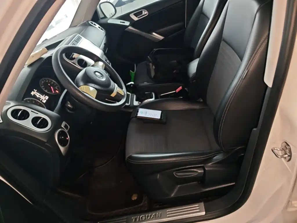Volkswagen Tiguan — фото 14