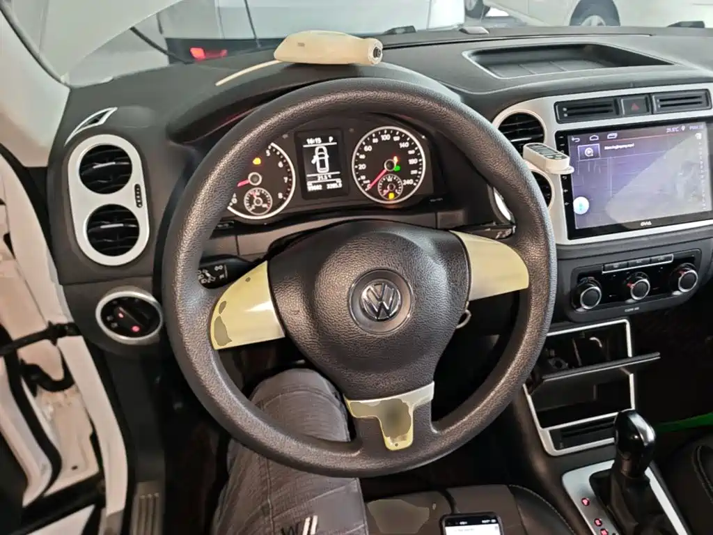 Volkswagen Tiguan — фото 10