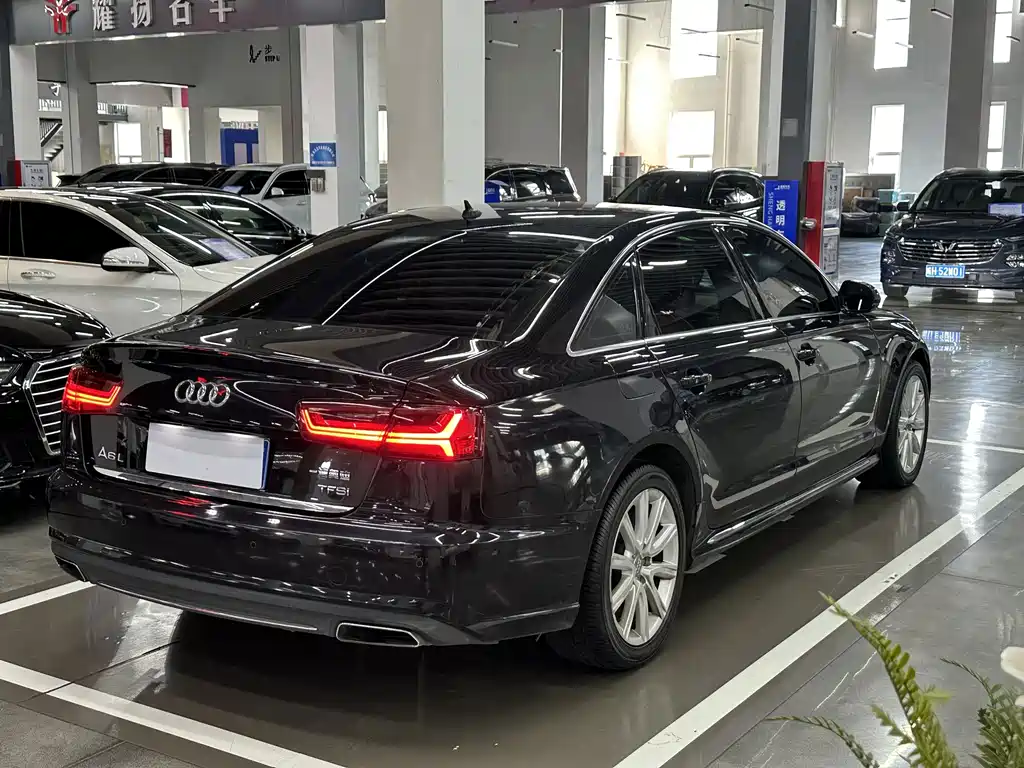 Audi A6L — фото 10
