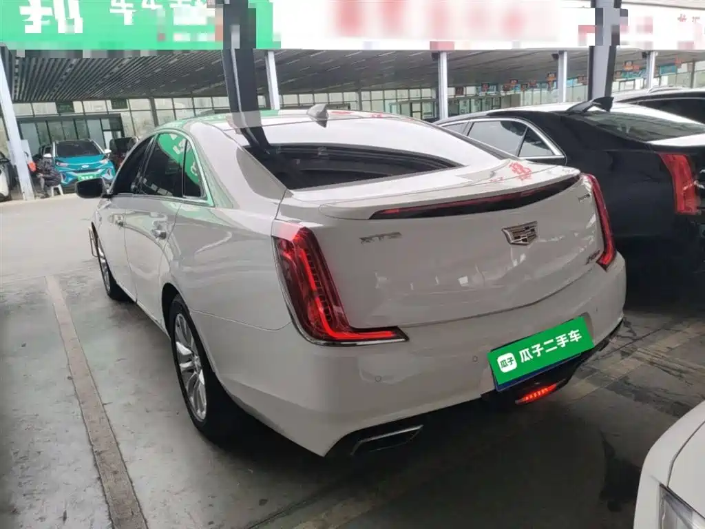 Cadillac XTS — фото 23