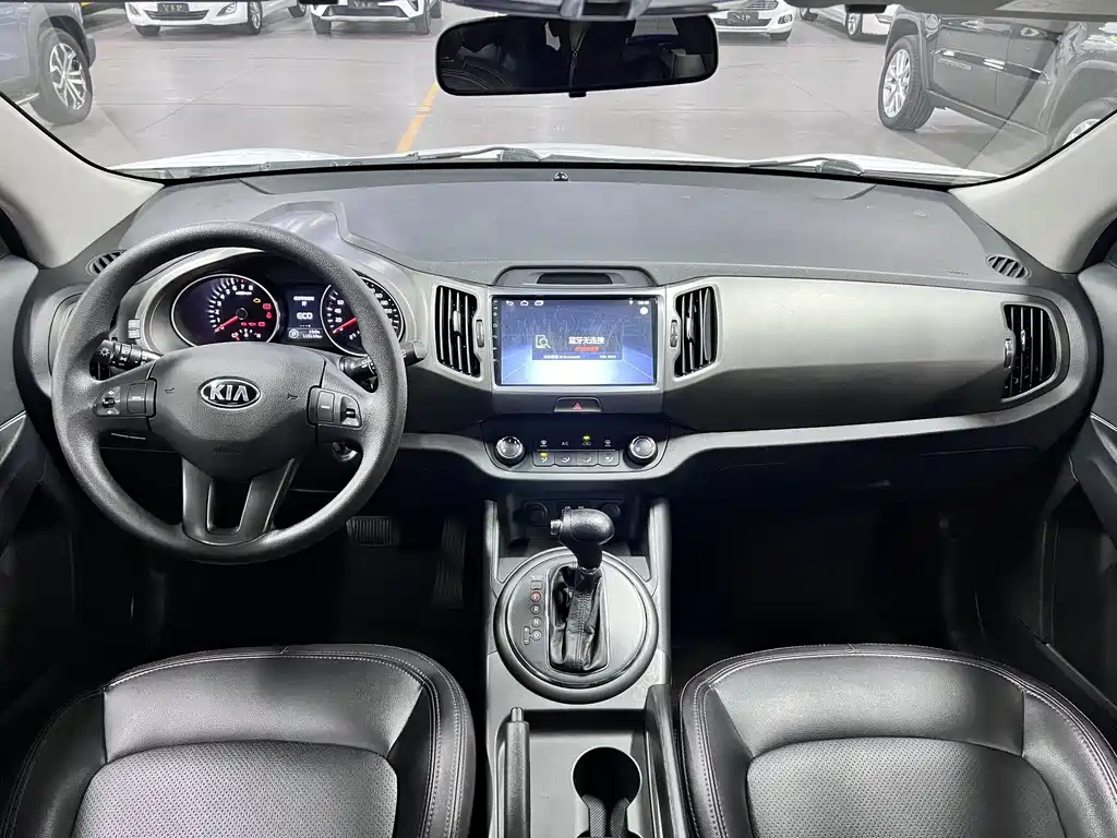 Kia Sportage — фото 11
