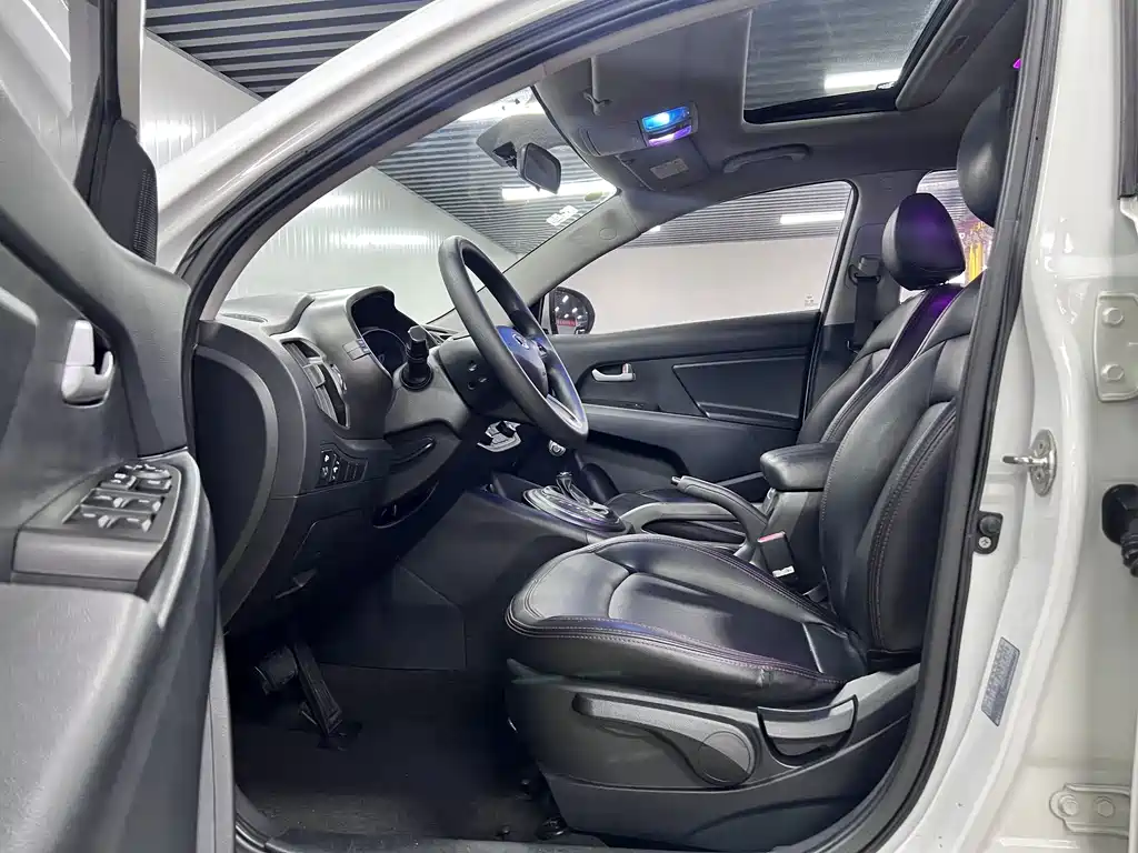 Kia Sportage — фото 7