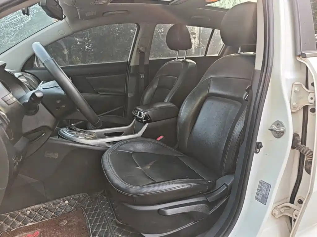 Kia Sportage — фото 14