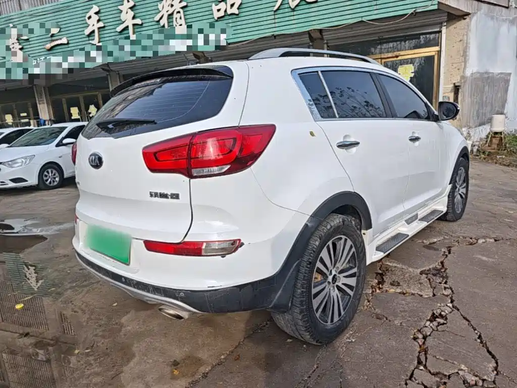Kia Sportage — фото 6