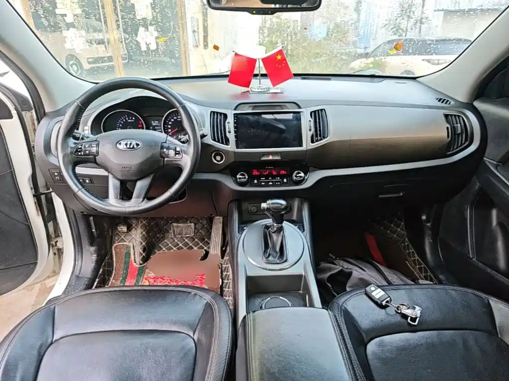 Kia Sportage — фото 9