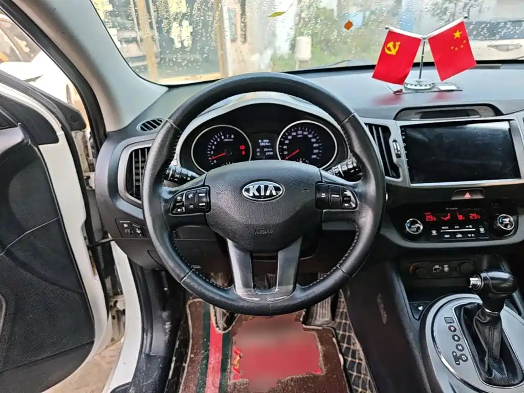 Kia Sportage — фото 10