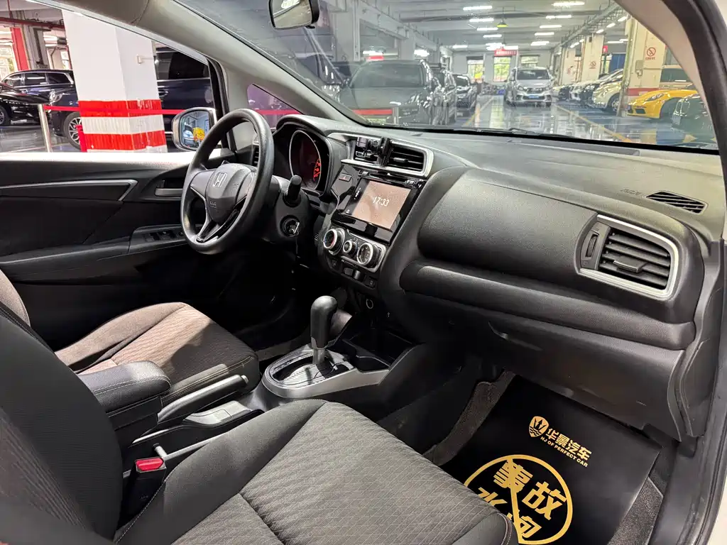 Honda Fit — фото 11
