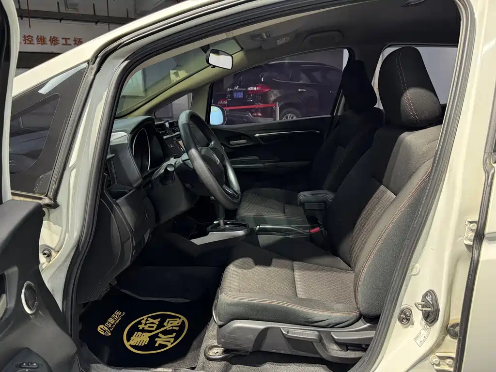 Honda Fit — фото 14