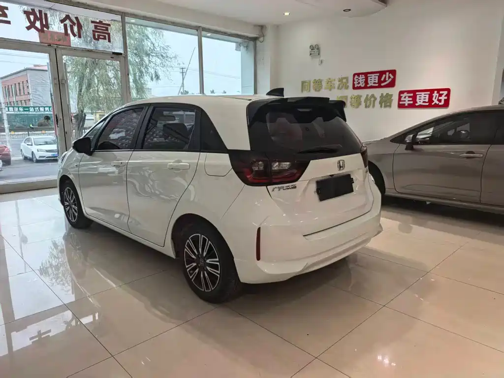 Honda Fit — фото 11