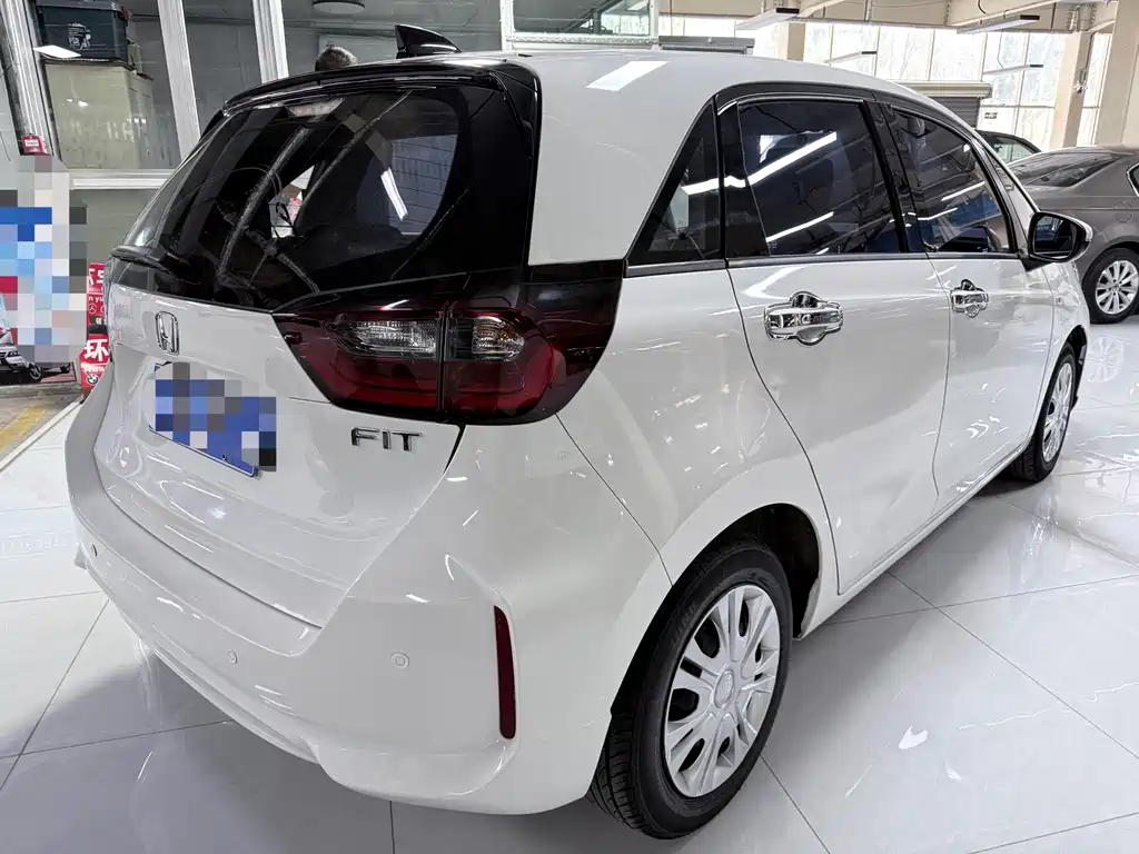 Honda Fit — фото 16