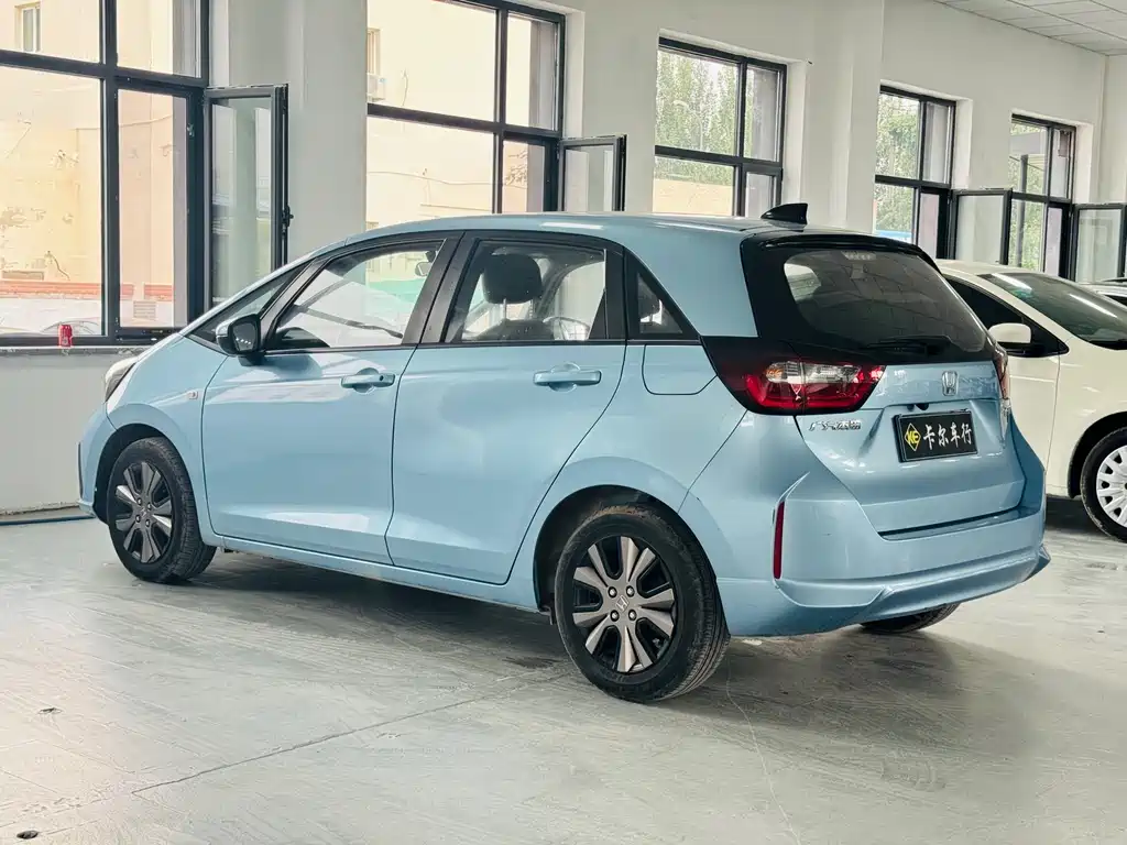 Honda Fit — фото 9