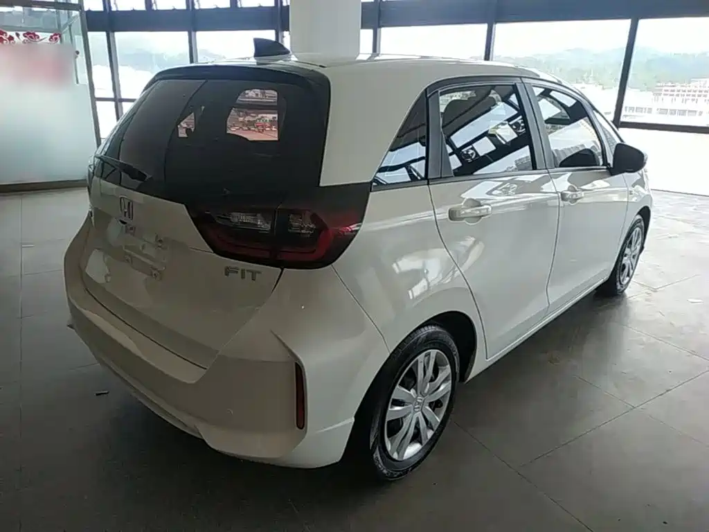 Honda Fit — фото 7