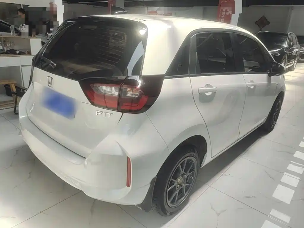 Honda Fit — фото 7