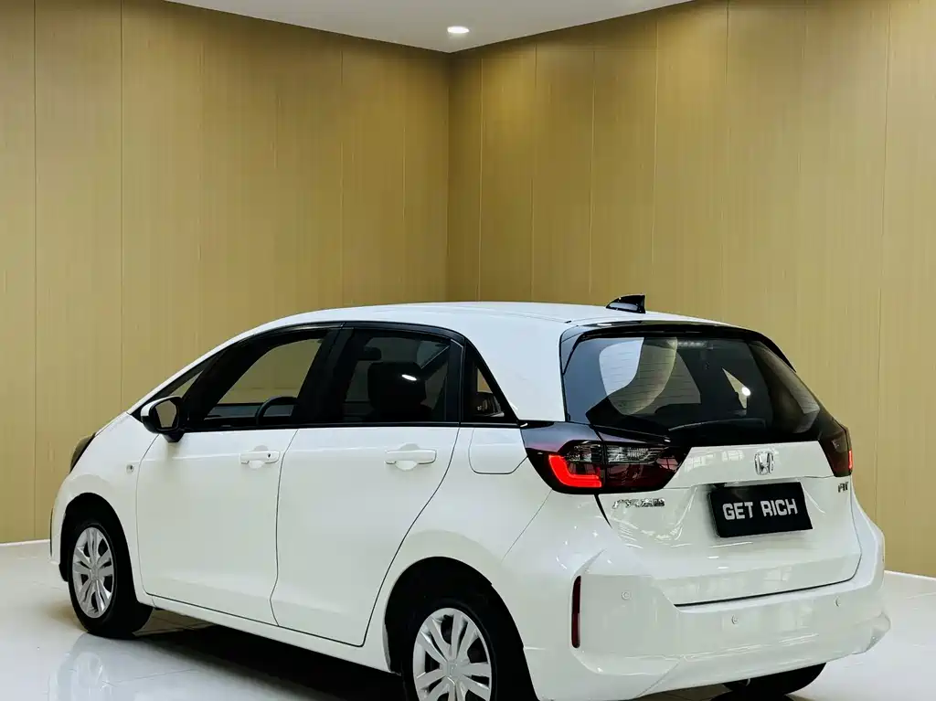 Honda Fit — фото 13