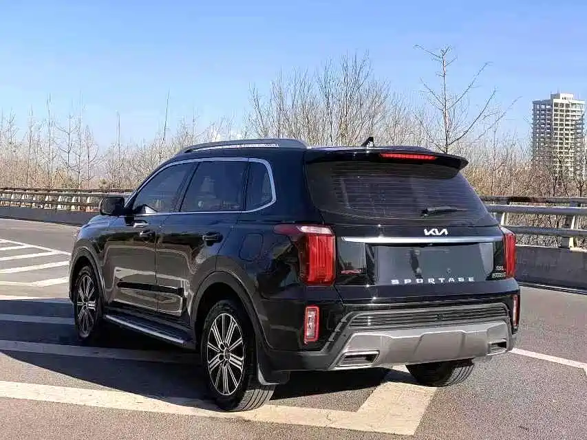 Kia Sportage — фото 7