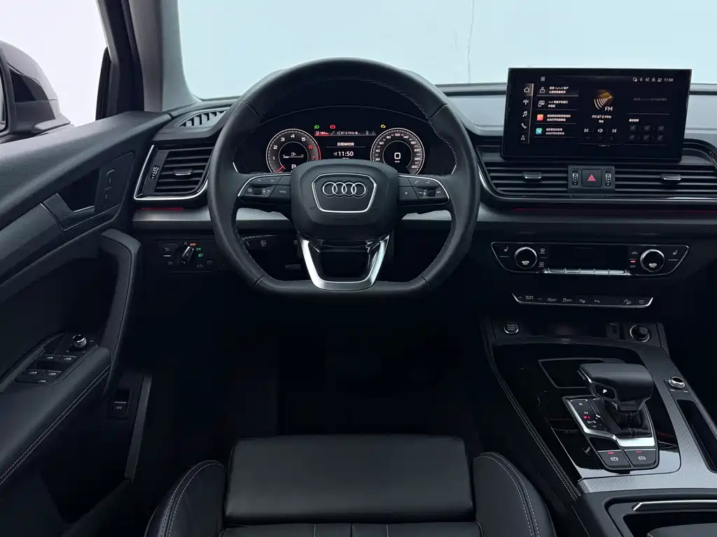 Audi Q5L — фото 19