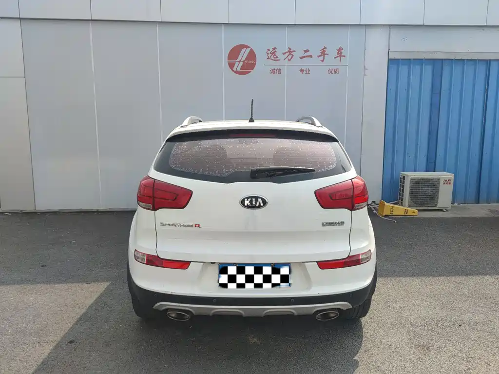 Kia Sportage — фото 11